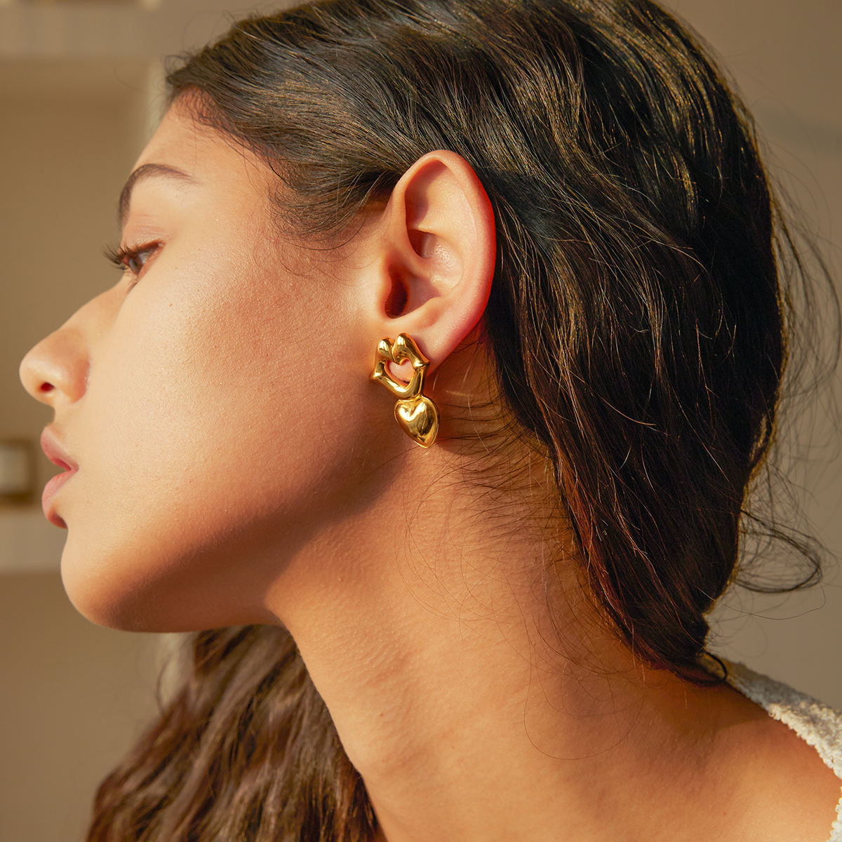 Jazbaat Gold-Plated Carved Lips & Heart Anti-Tarnish Drop Earrings