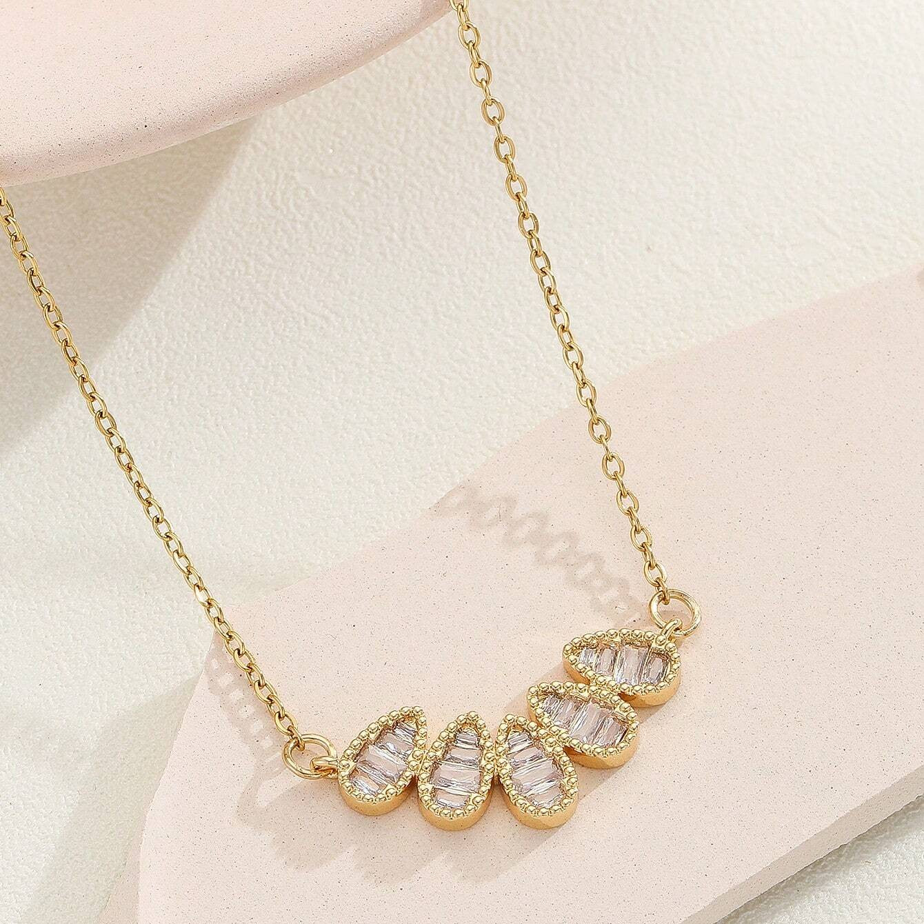 Jazbaat Gold-Plated Stainless Steel Raindrop-Shaped Zirconia Embedded Pendant Necklace