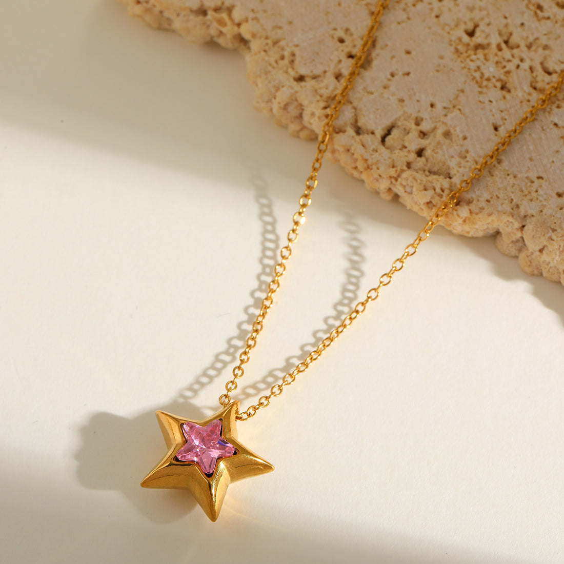 Jazbaat Gold-Plated Star-Shaped Pink Zirconia Studded Pendant Necklace