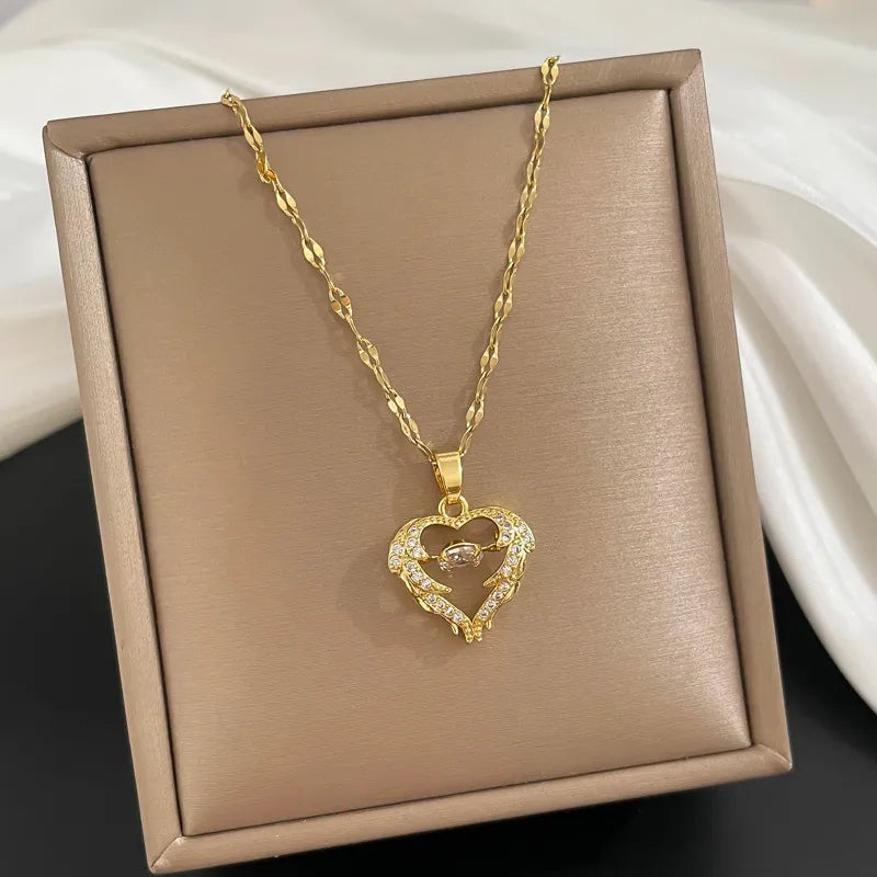 Jazbaat Golden Heart-Shaped Dancing Diamond Rhinestone Pendant Necklace