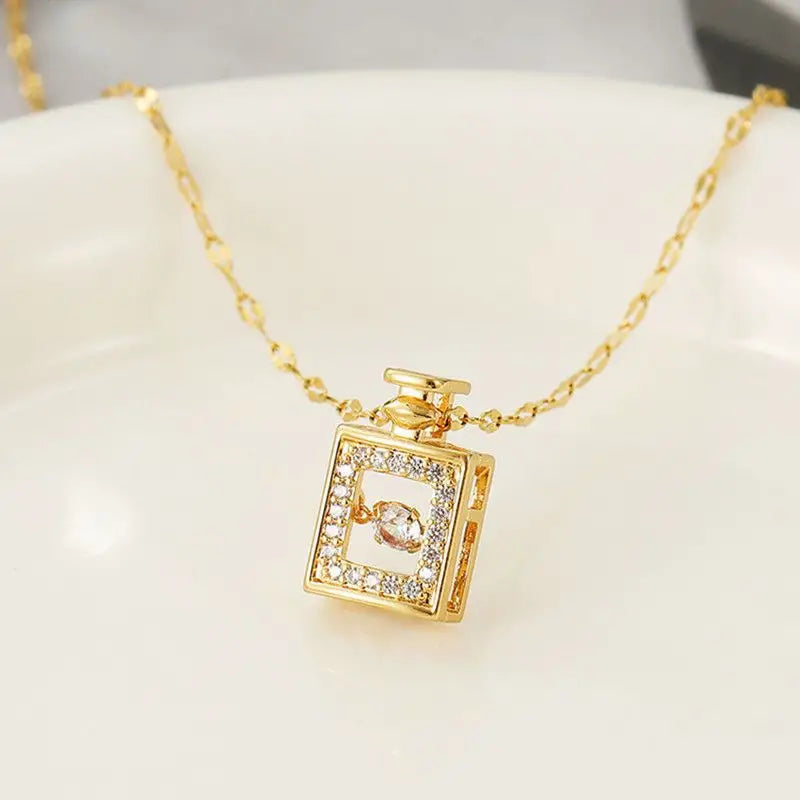 Jazbaat Golden Perfume Bottle Dancing Diamond Pendant Necklace