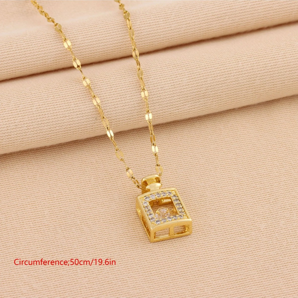 Jazbaat Golden Perfume Bottle Dancing Diamond Pendant Necklace