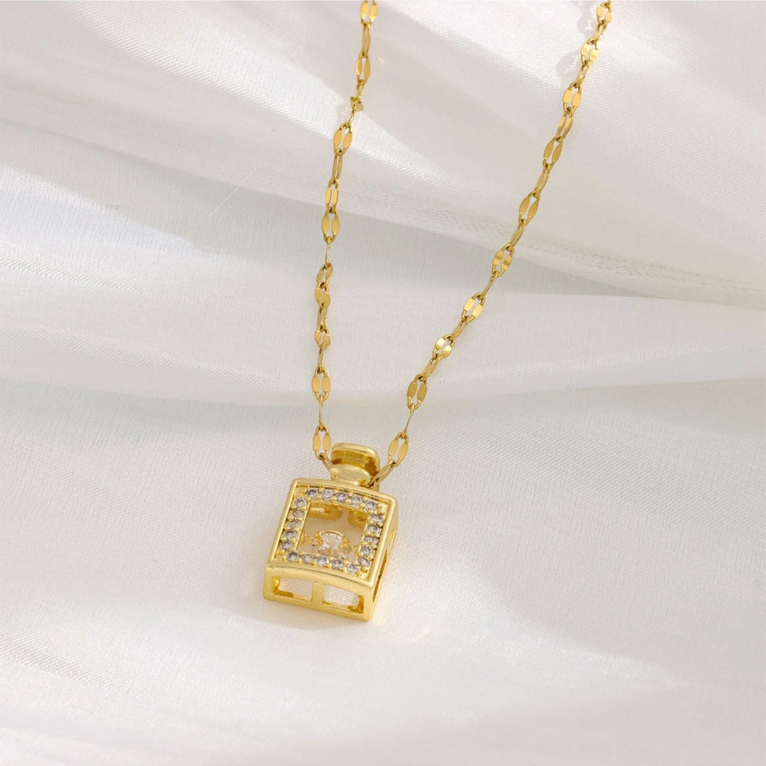 Jazbaat Golden Perfume Bottle Dancing Diamond Pendant Necklace