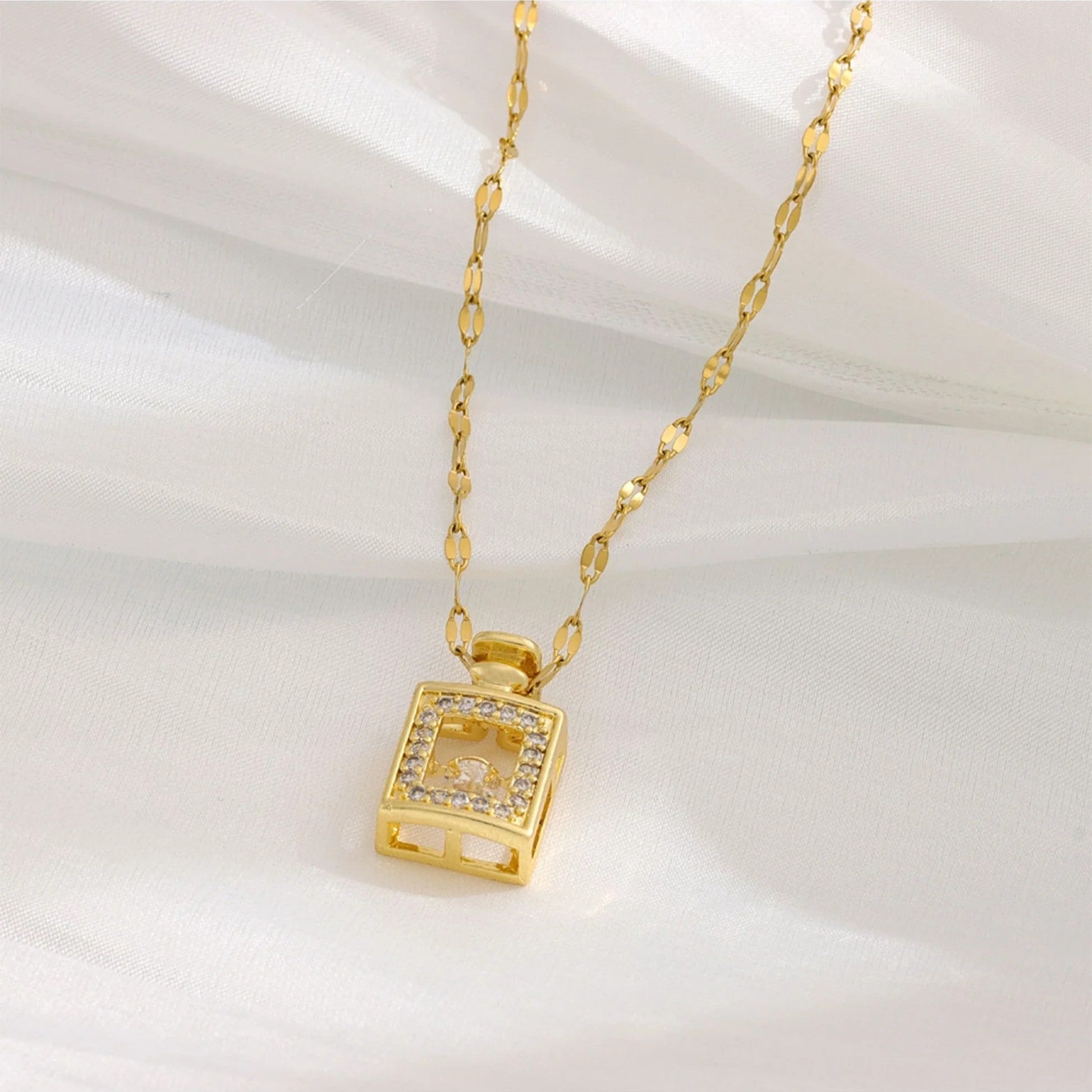 Jazbaat Golden Perfume Bottle Dancing Diamond Pendant Necklace