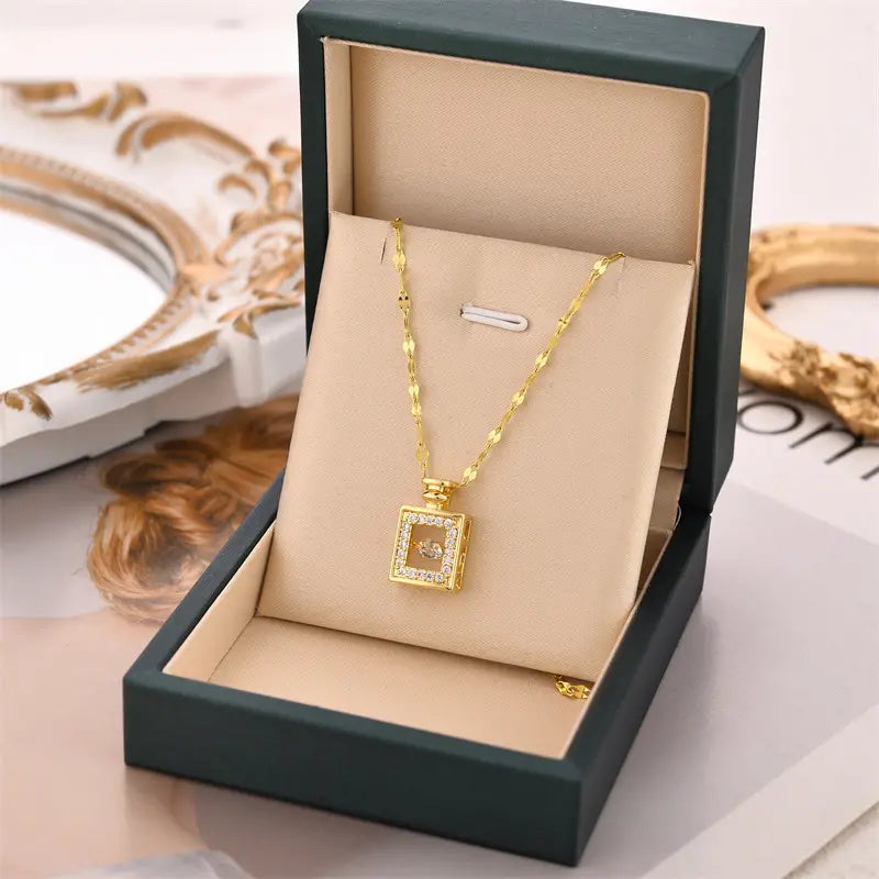 Jazbaat Golden Perfume Bottle Dancing Diamond Pendant Necklace