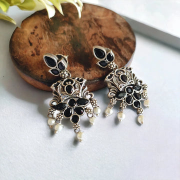 Jazbaat Oxidised Silver-Lookalike Black Stone-Studded Pearl Dangler Earrings
