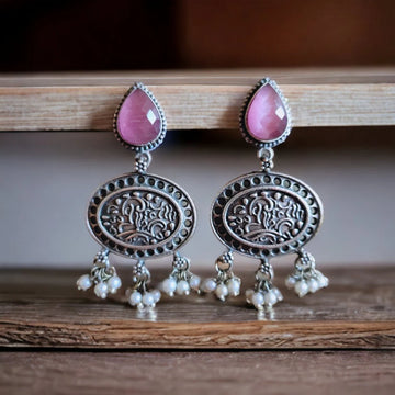 Jazbaat Oxidised Silver-Lookalike Pink Stone-Studded Pearl Dangler Earrings (JERDRP133)