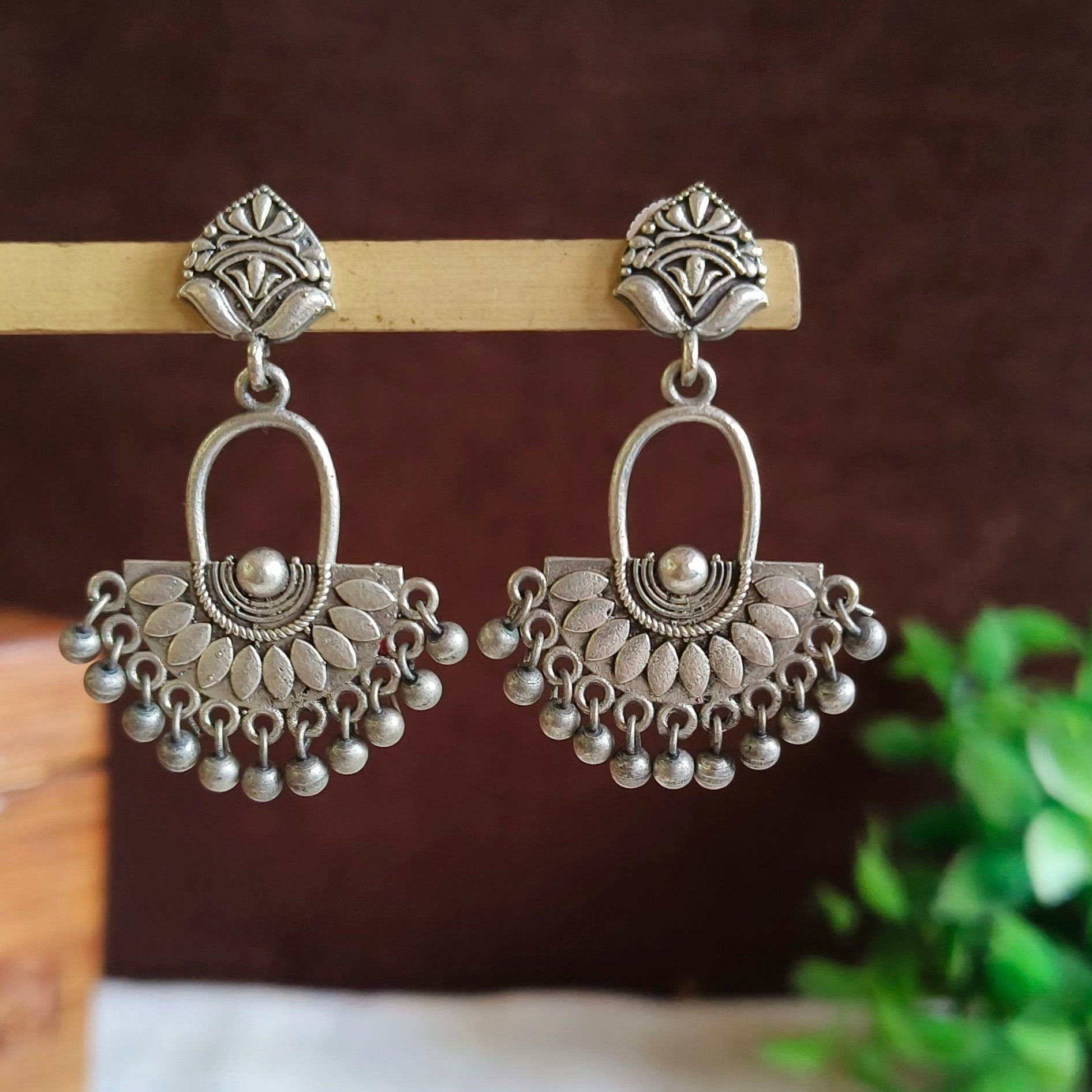 Jazbaat Oxidised Silver-Replica Intricate Embossed Ghungroo Dangler Earrings