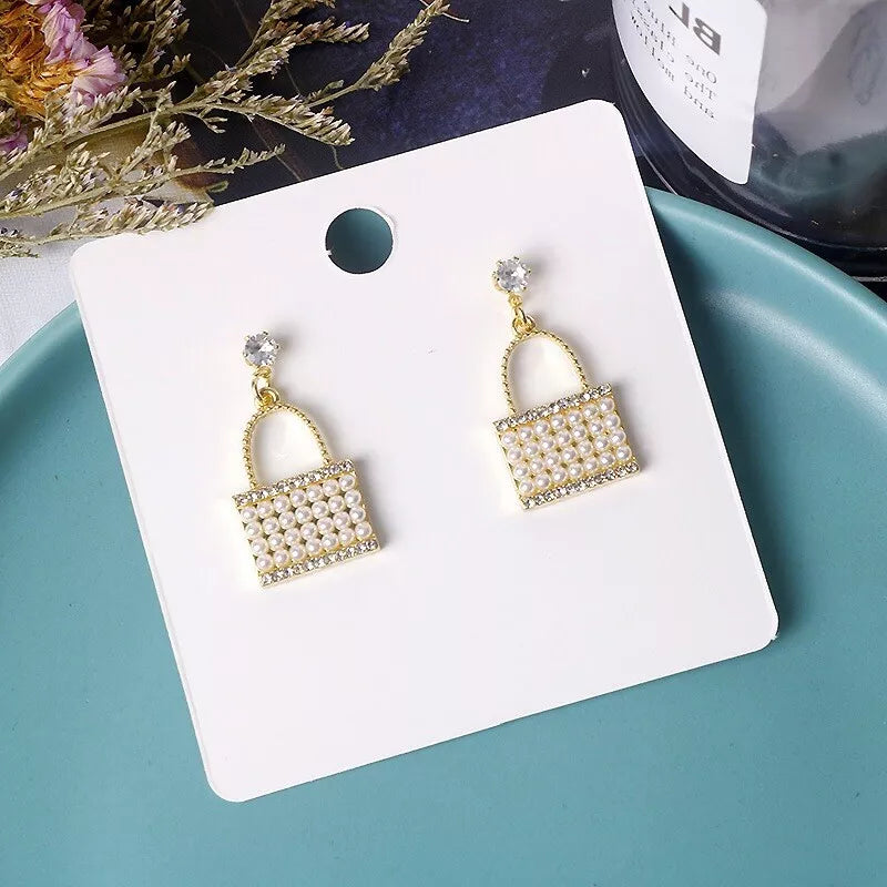 Jazbaat Purse-Shaped Crystal & Pearl Studded Korean Earrings