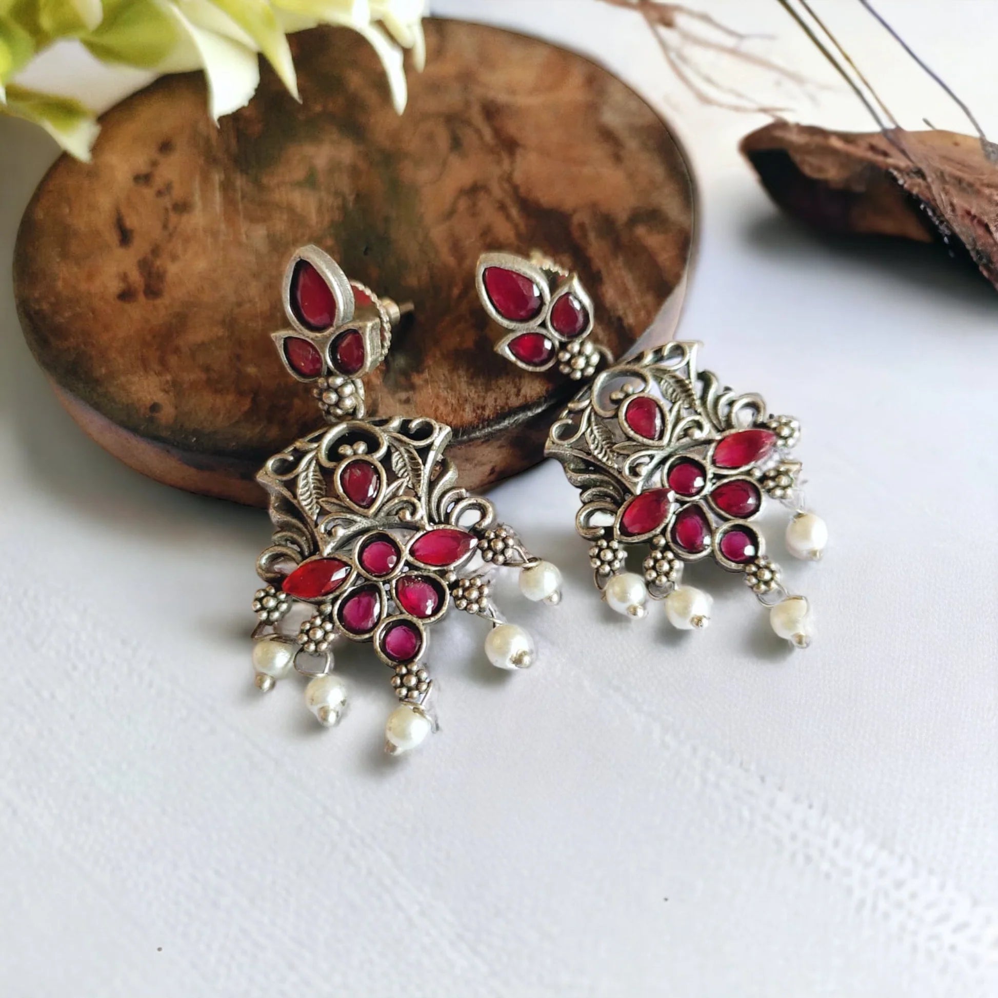 Jazbaat Silver-Plated Ruby Stone-Studded Dangler Earrings